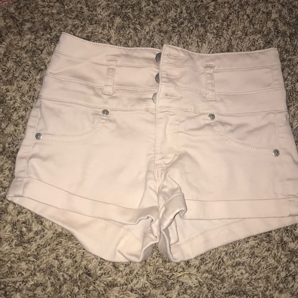 High waisted cuffed jegging material shorts.